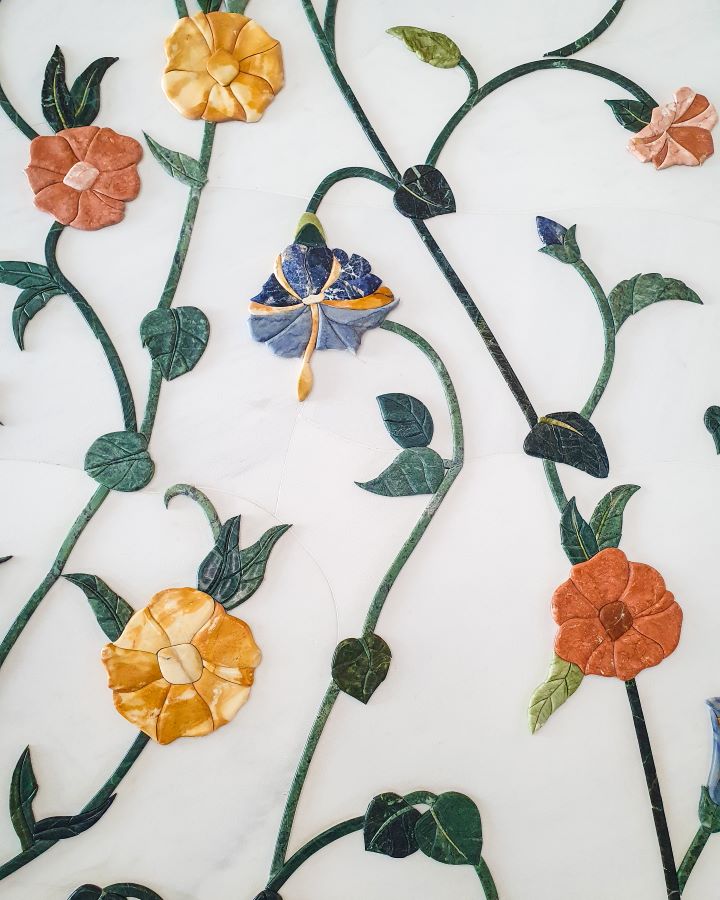 Abu Dhabi UAE Sheikh Zayed Grand Mosque from Dubai: Get Your Guide Review Flowers made of green, blue, red and orange marble on the walls of the mosque in Abu Dhabi, UAE. Sheikh Zayed Grand Mosque from Dubai: Get Your Guide Review.